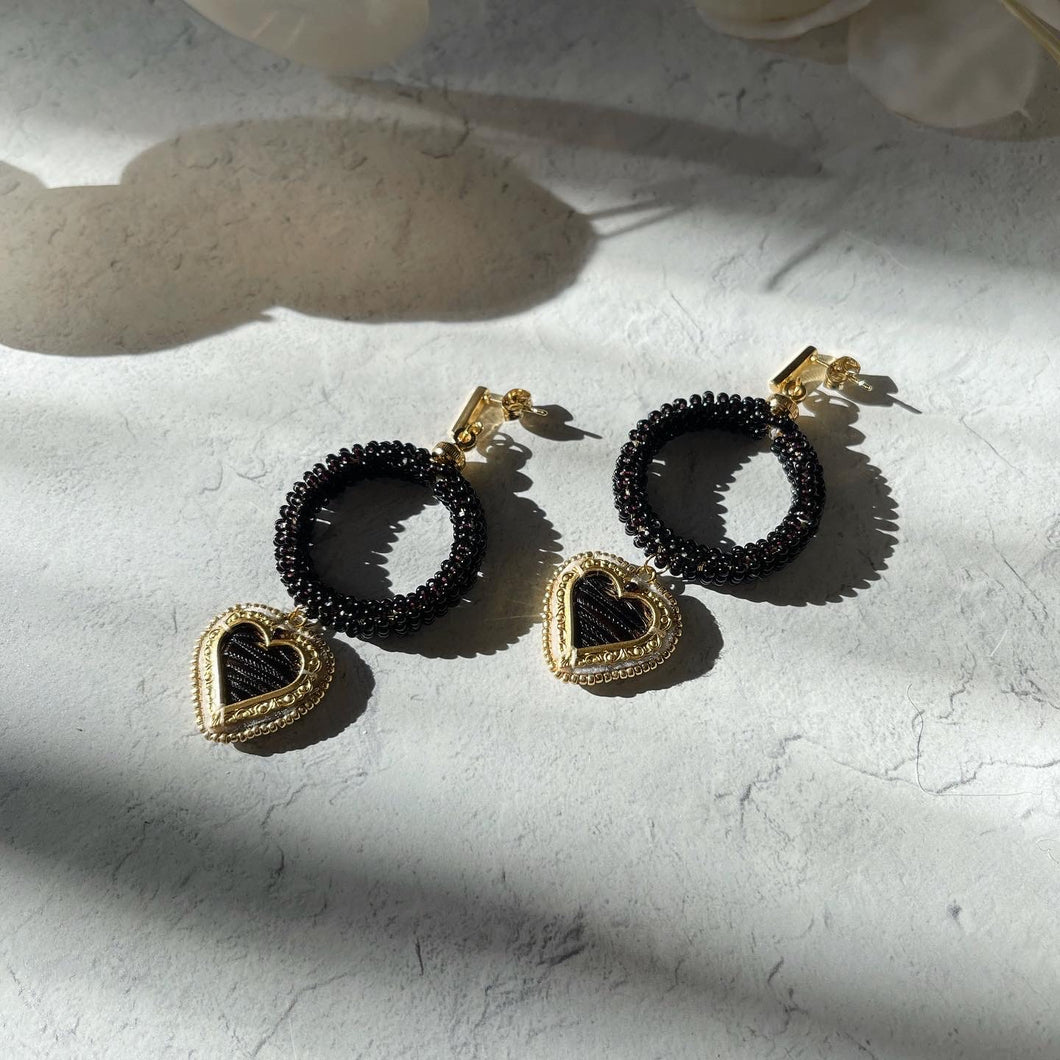 Black beaded hoops with black quilled hearts