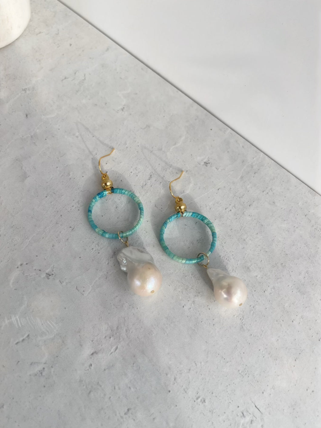 Small turquoise quilled hoops with elk tooth shaped pearls