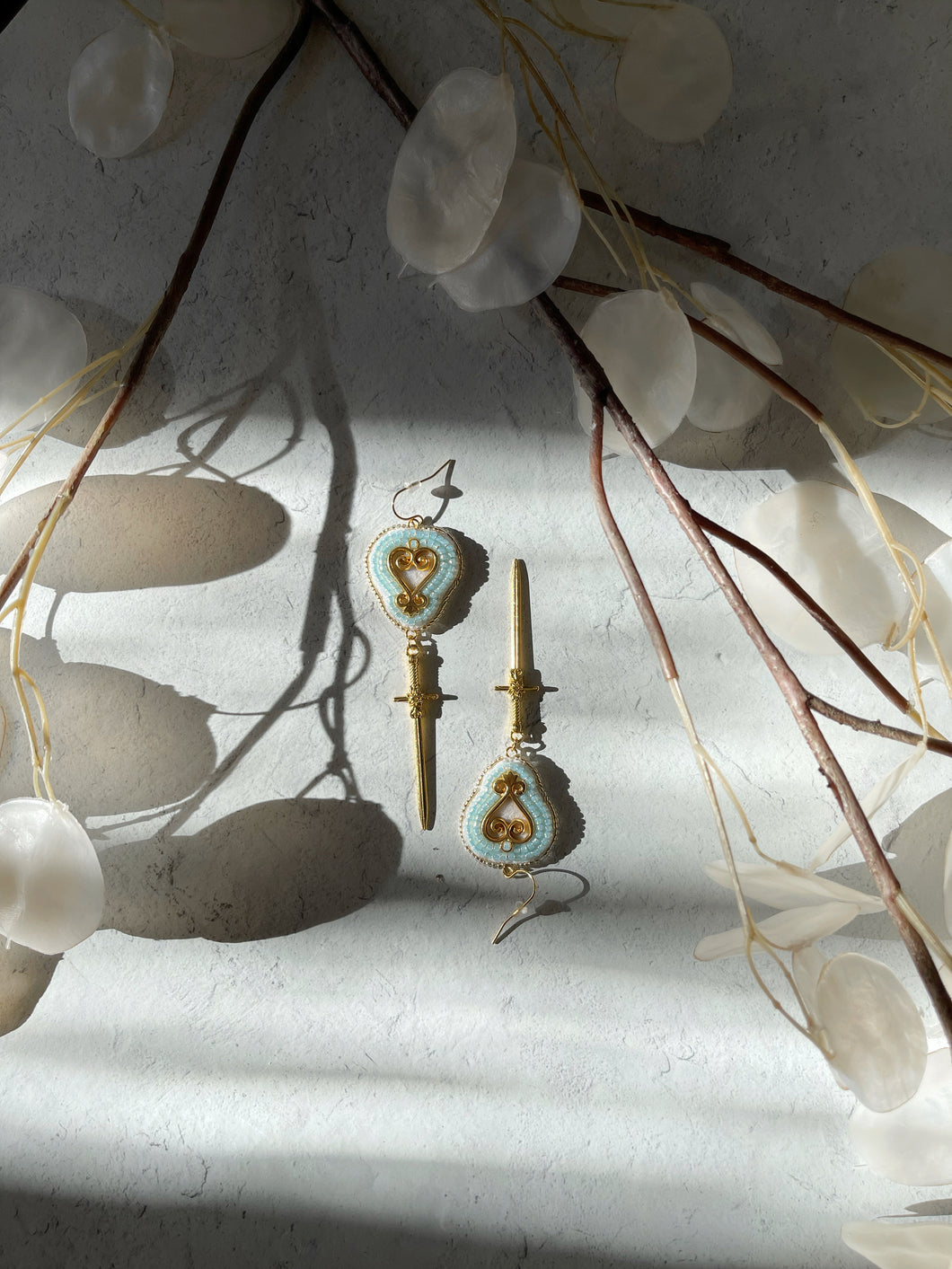 Sankofa sword earrings