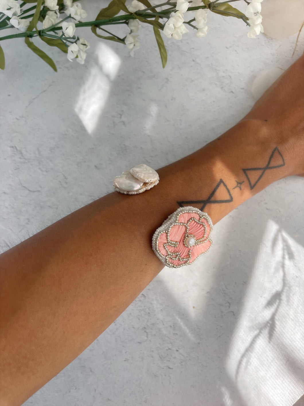 Quilled coral flower and pearl bracelet